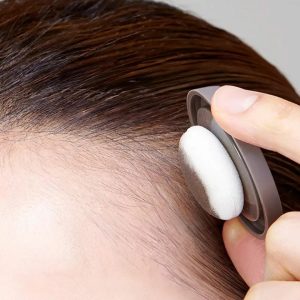 Polvo retocador de raíz